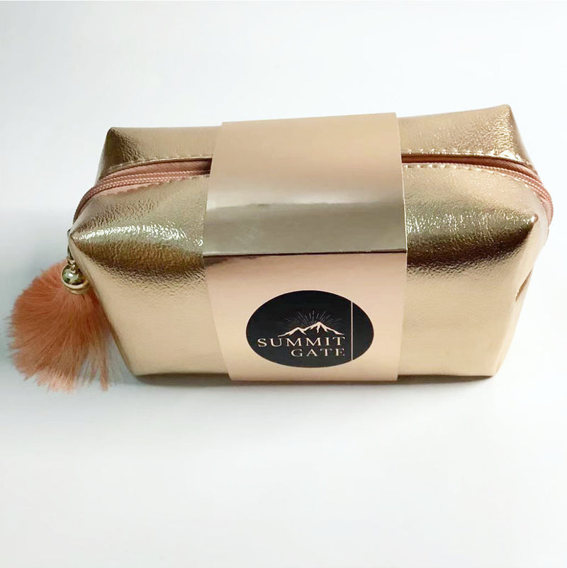 gold luxury style faux leather cosmetic pouch with tassel | luxury style